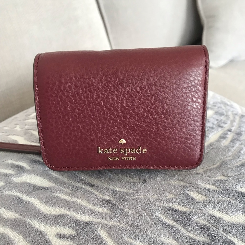 Kate Spade New York Jackson Small Trifold Continental Wallet Color: cherrywood